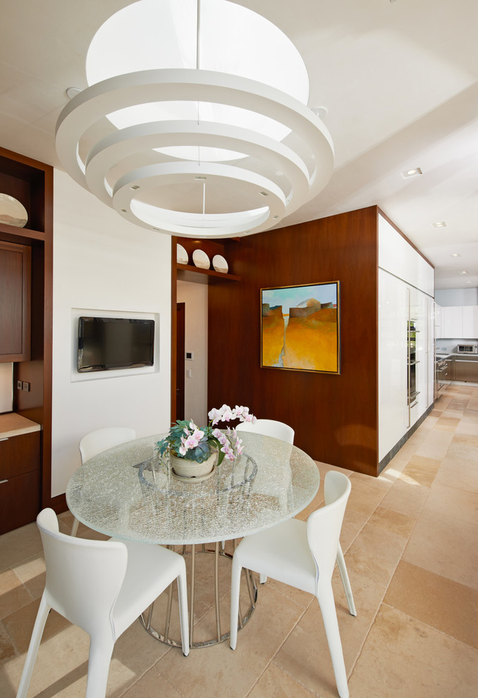 Design ideas for a contemporary kitchen/dining combo in Miami with white walls.