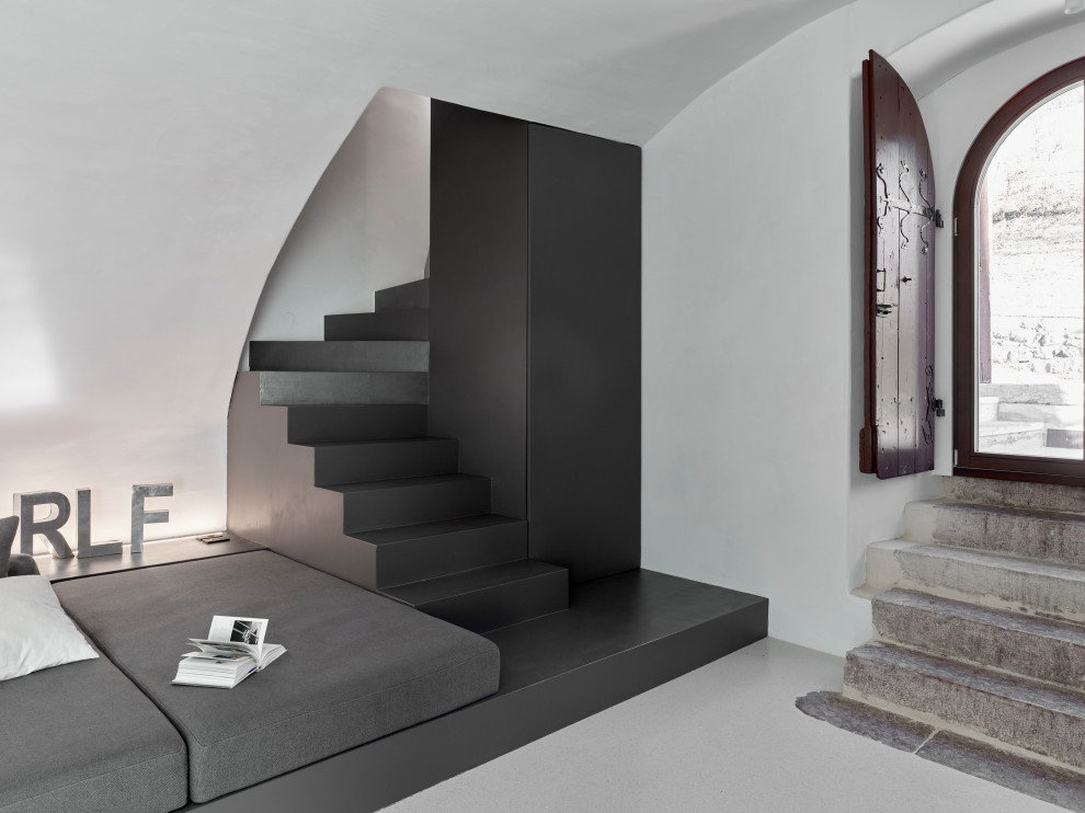 This is an example of a contemporary l-shaped staircase in Other.