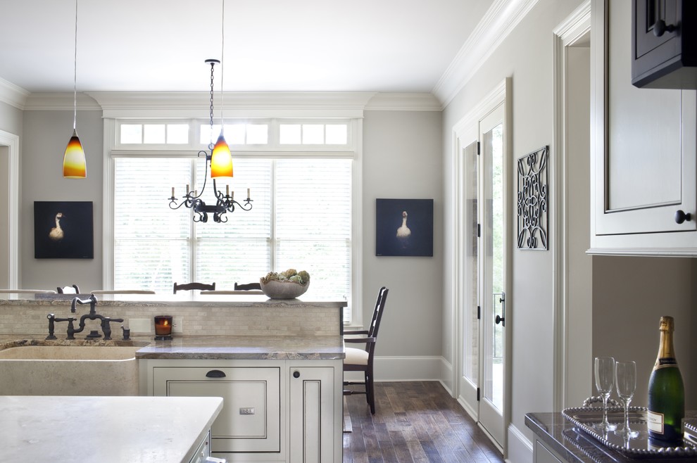 Design ideas for a traditional eat-in kitchen in Atlanta with a farmhouse sink.