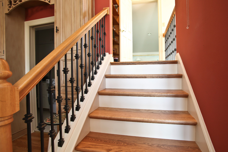 Design ideas for a mid-sized country staircase in Milwaukee.