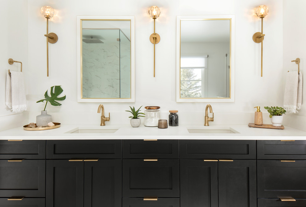 Inspiration for a scandinavian bathroom in Denver with shaker cabinets, black cabinets, white walls, an undermount sink and white benchtops.