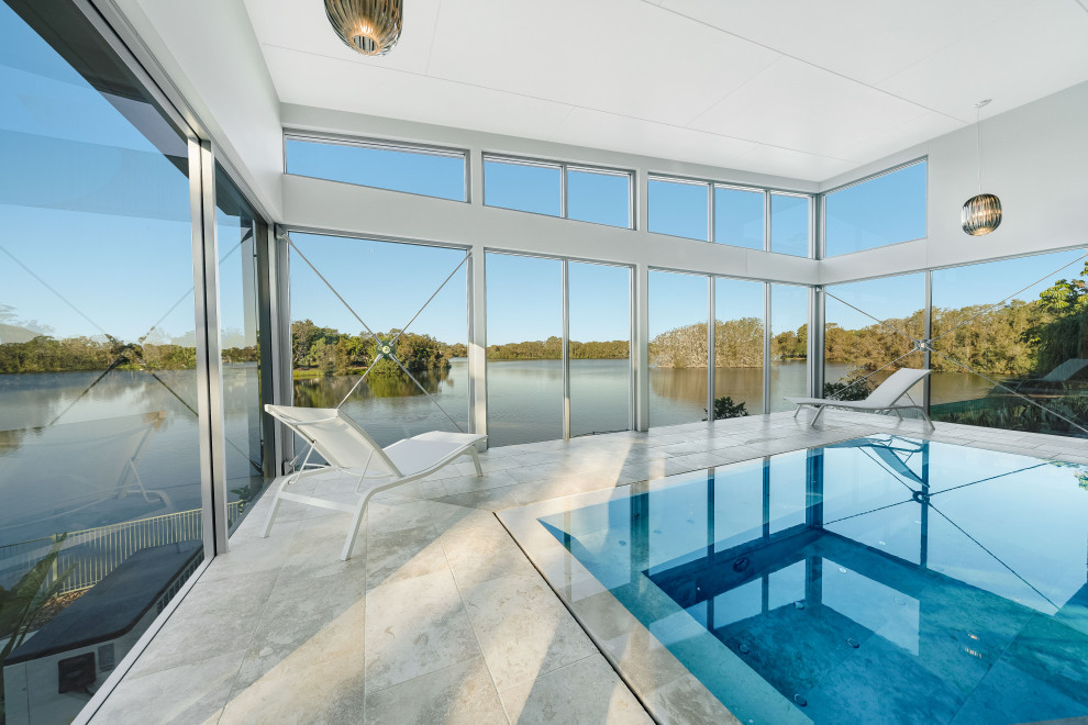 Photo of a contemporary indoor rectangular pool in Gold Coast - Tweed with tile.