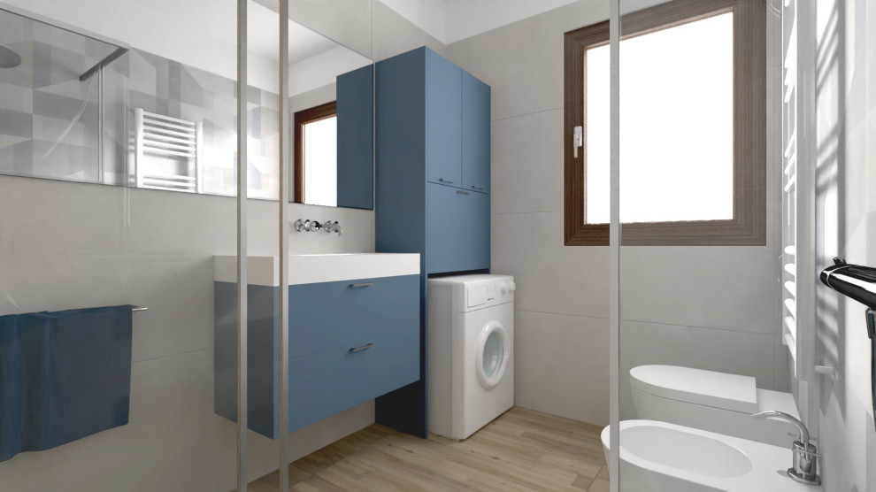 Идея дизайна: маленькая ванная комната со стиральной машиной в современном стиле с плоскими фасадами, синими фасадами, разноцветной плиткой, керамогранитной плиткой, полом из винила, душевой кабиной, тумбой под одну раковину и подвесной тумбой для на участке и в саду