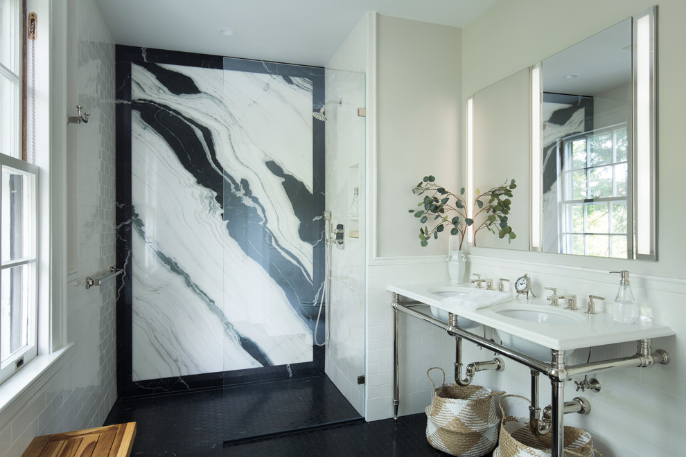 Design ideas for a mid-sized transitional master bathroom in Boston with a curbless shower, white tile, porcelain tile, beige walls, marble floors, an undermount sink, engineered quartz benchtops, black floor, an open shower and white benchtops.