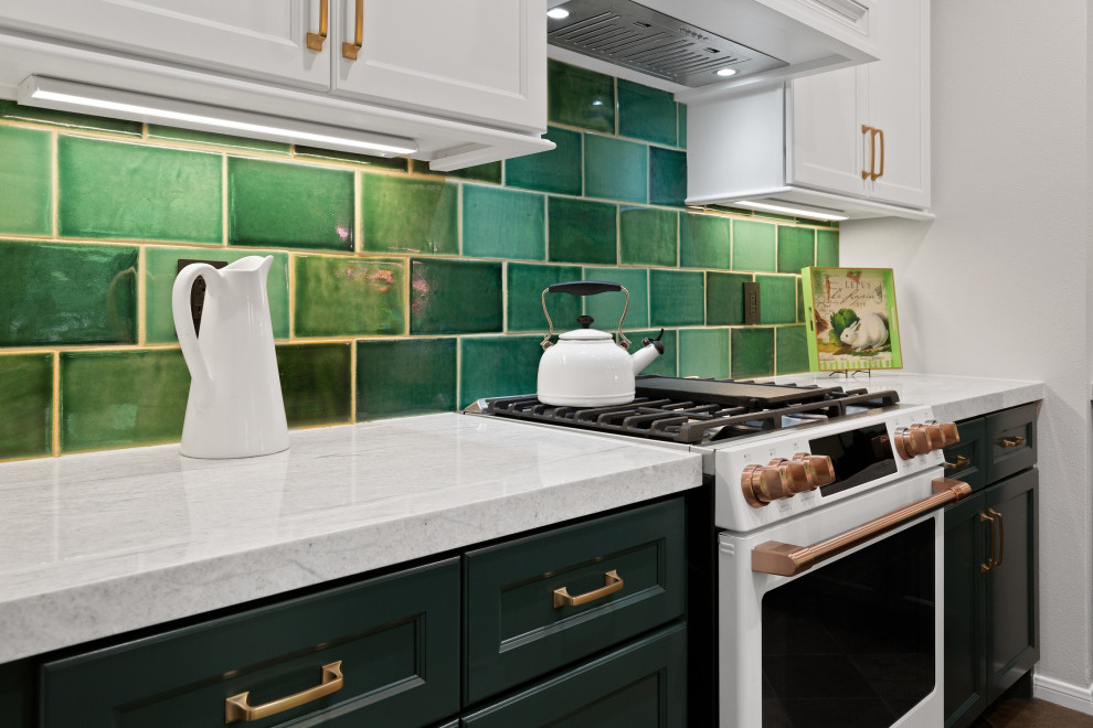 Small classic l-shaped kitchen/diner in Houston with a belfast sink, beaded cabinets, green cabinets, quartz worktops, green splashback, ceramic splashback, white appliances, an island and white worktops.