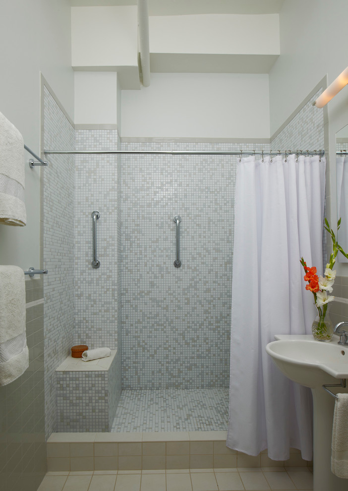 Design ideas for a transitional bathroom in New York with a pedestal sink, an alcove shower, gray tile and mosaic tile.