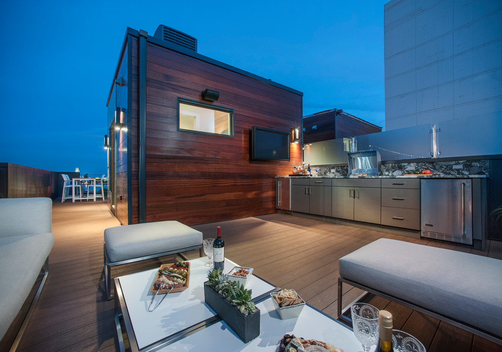 Large contemporary rooftop deck in Philadelphia with an outdoor kitchen and no cover.