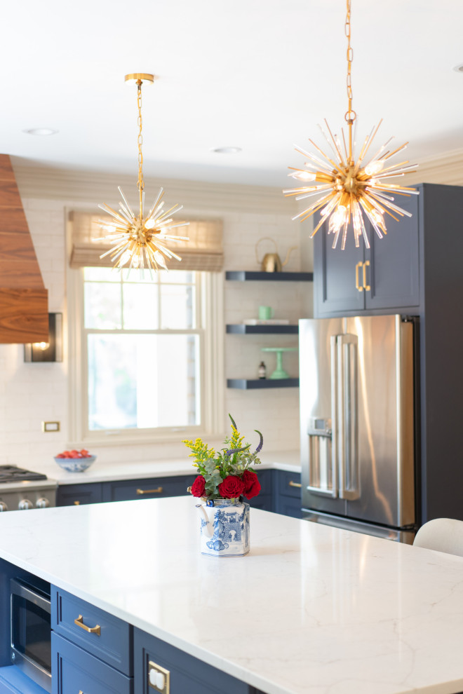 Modern Glam Kitchen With Starburst Pendants & Navy Cabinetry