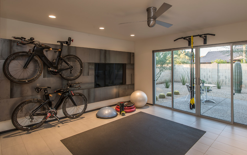 This is an example of a mid-sized contemporary home yoga studio in Phoenix with grey walls.