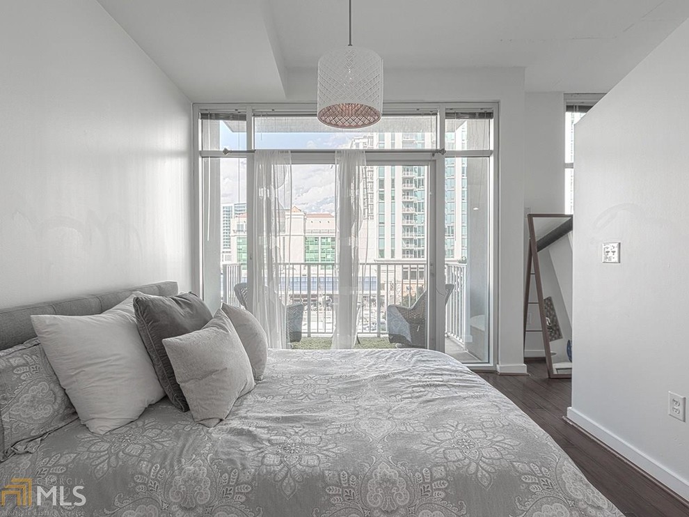 Example of a cottage chic bedroom design in Atlanta