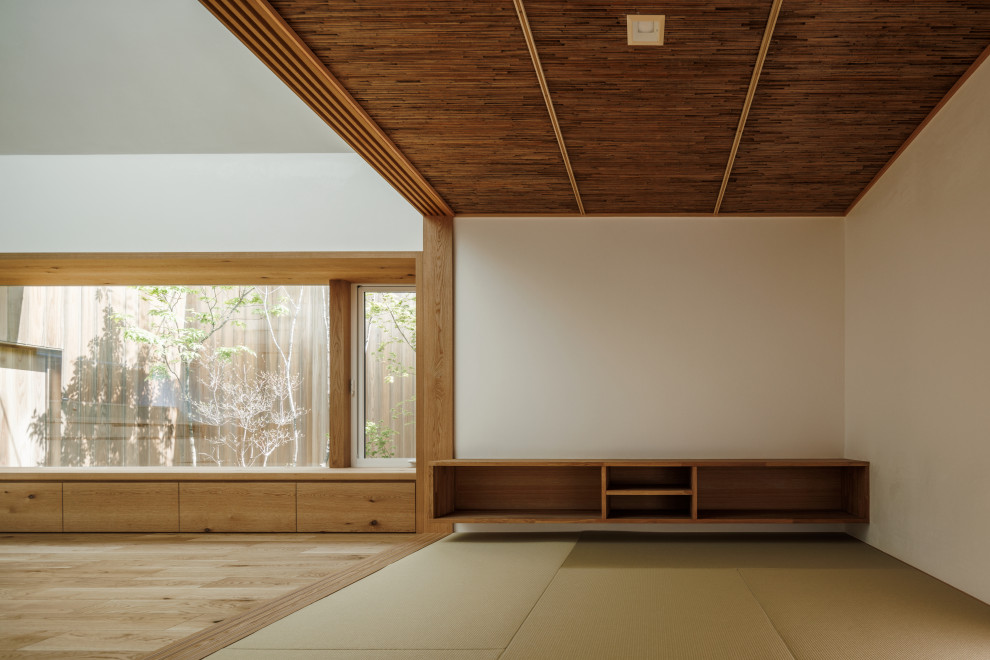 他の地域にあるおしゃれなファミリールームの写真