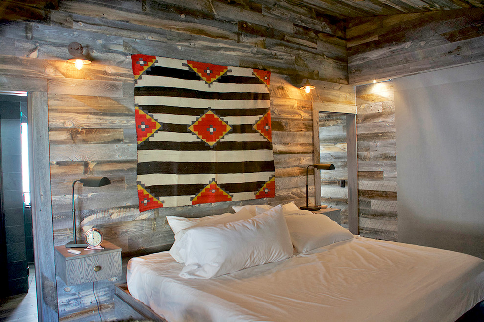 Inspiration for a mid-sized country master bedroom in Denver with grey walls and no fireplace.