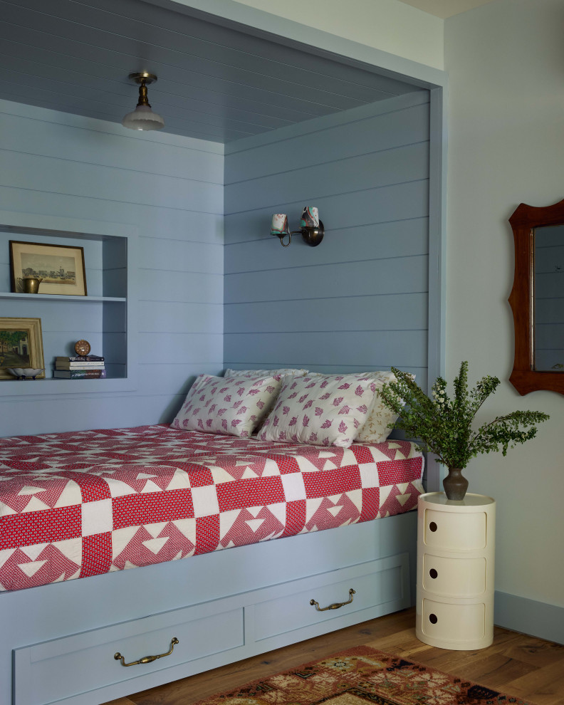 Catskills Lakehouse - Inspiration for a bedroom cottage medium tone wood floor, gray floor and shiplap wall kids' bedroom remodel in Nashville with white walls