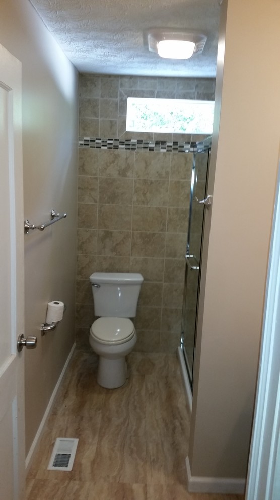 Mid-sized transitional 3/4 beige tile and ceramic tile porcelain tile and beige floor alcove shower photo in Columbus with a two-piece toilet and beige walls