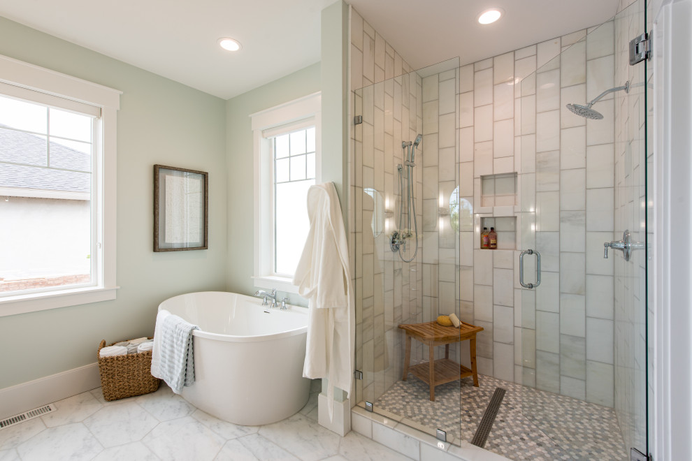 Photo of a large transitional master bathroom in Salt Lake City with a freestanding tub, an alcove shower, gray tile, green walls, grey floor, a hinged shower door, shaker cabinets, grey cabinets, an undermount sink, quartzite benchtops, white benchtops, a niche, a shower seat, a double vanity and a built-in vanity.