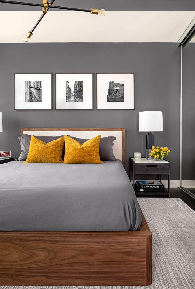 Mid-sized contemporary master bedroom in Toronto with grey walls, dark hardwood floors and brown floor.