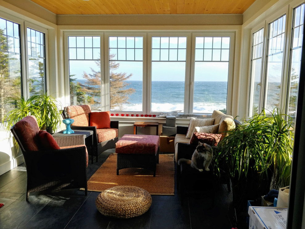 Example of a beach style sunroom design in Other
