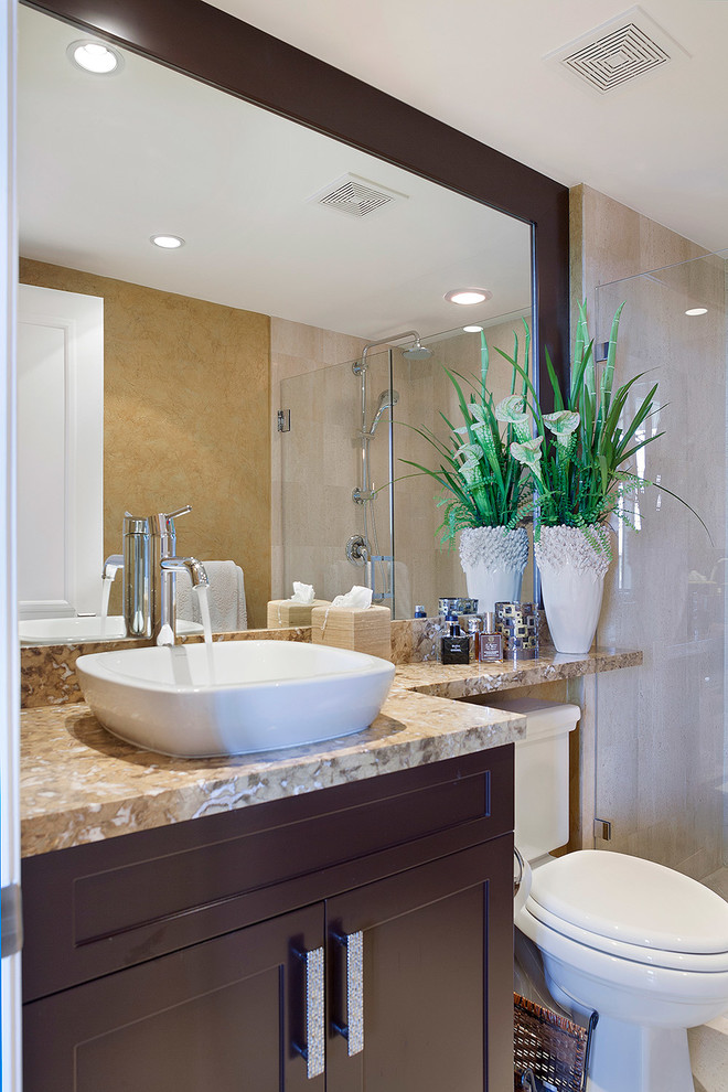 Inspiration for a large transitional 3/4 alcove shower remodel in Miami with multicolored walls, dark wood cabinets, recessed-panel cabinets, a two-piece toilet, a vessel sink, granite countertops, a hinged shower door and multicolored countertops