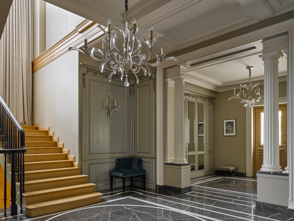 Design ideas for a transitional hallway in Saint Petersburg with white walls, marble floors and black floor.