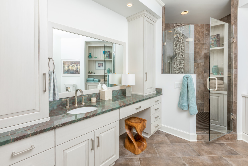 Inspiration for a large transitional master wet room bathroom in Other with raised-panel cabinets, white cabinets, brown tile, white walls, an undermount sink, brown floor, a hinged shower door, turquoise benchtops, ceramic floors and quartzite benchtops.