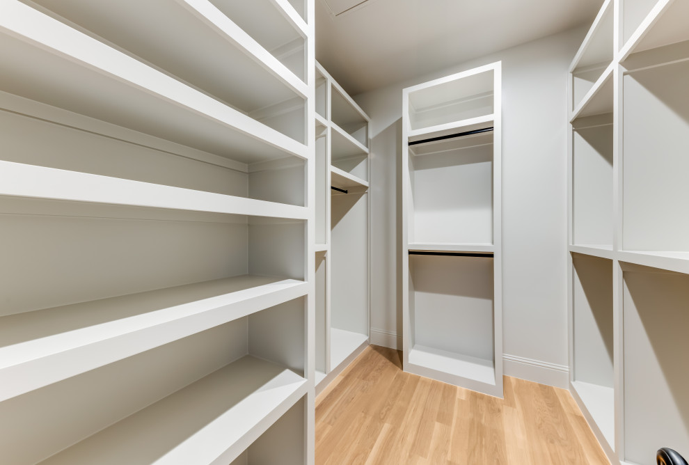 Inspiration for a transitional closet remodel in Dallas