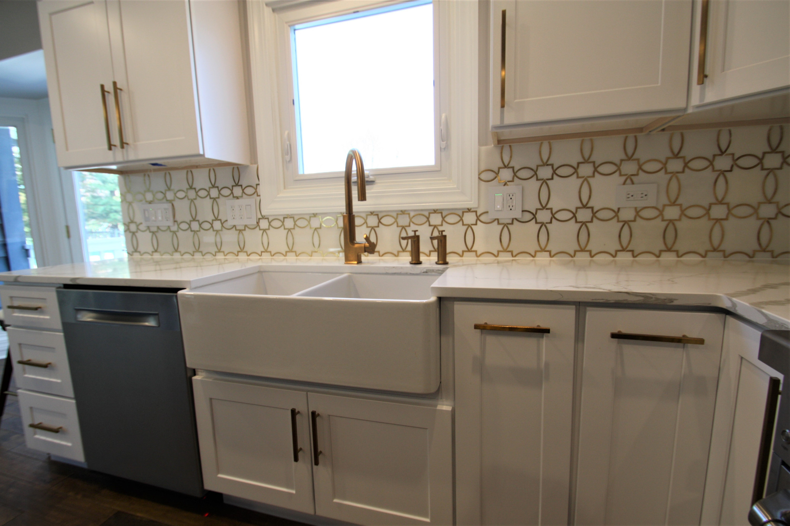 Modern kitchen design and remodel. Shaker style cabinets in white and blue.