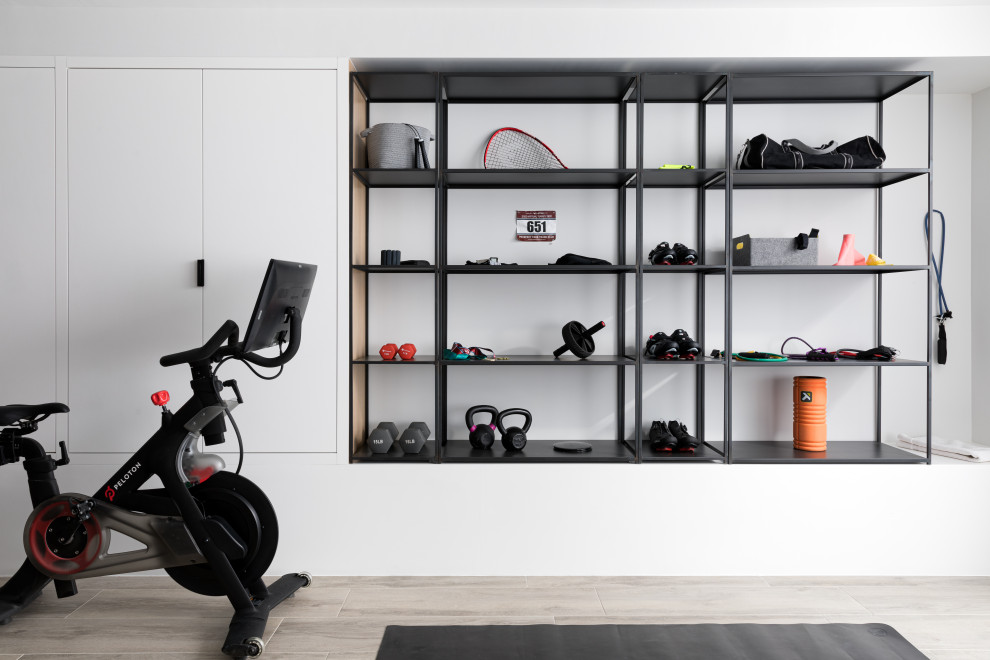 Medium sized contemporary home gym in Austin with white walls, porcelain flooring and beige floors.