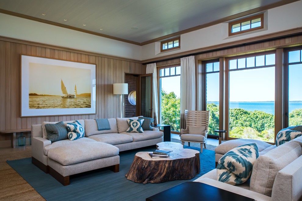 Large beach style formal open concept living room in Boston with brown walls, medium hardwood floors and brown floor.