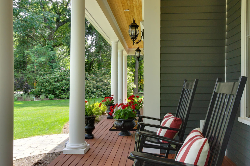 Large elegant gray two-story concrete fiberboard exterior home photo in Boston with a shingle roof