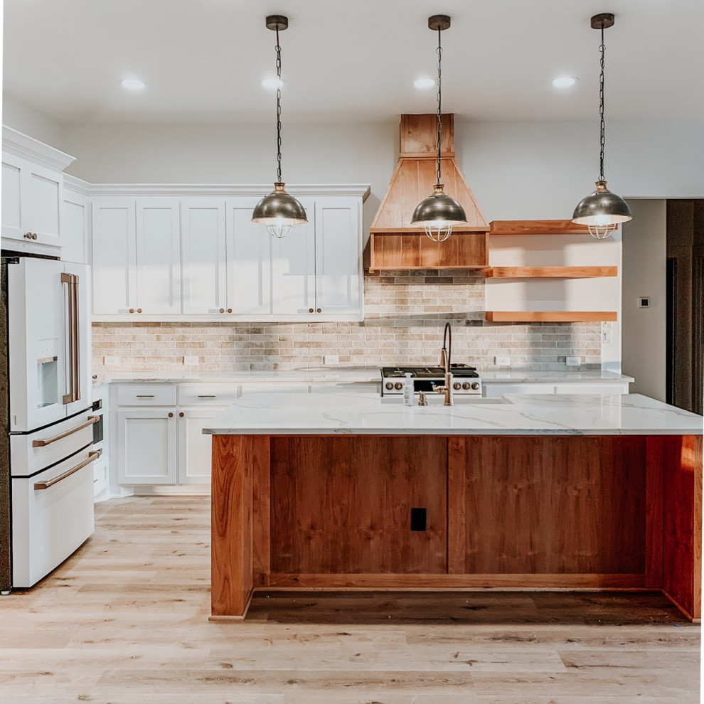 Example of a transitional vinyl floor kitchen design in Houston with porcelain backsplash