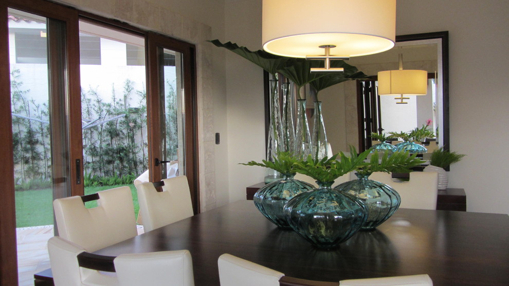 Inspiration for a tropical dining room in Other.