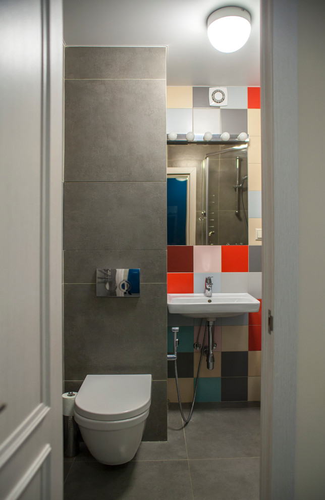 Photo of a contemporary bathroom in Moscow with multi-coloured tile and gray tile.