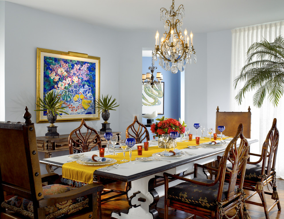 This is an example of an eclectic separate dining room in Miami.