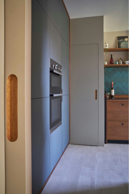 A recycling project midcentury-kitchen