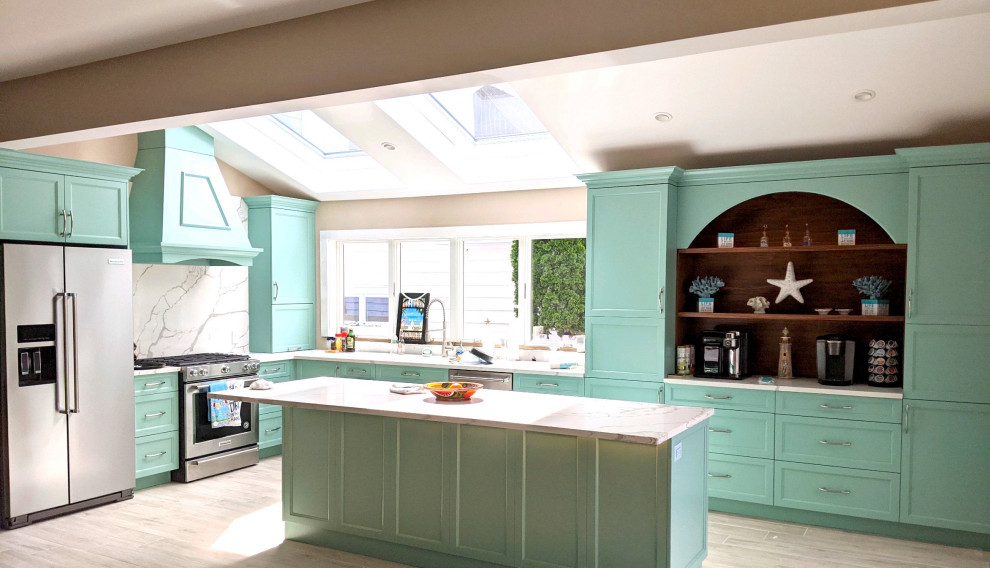 Large coastal galley kitchen/diner in New York with a built-in sink, shaker cabinets, turquoise cabinets, quartz worktops, multi-coloured splashback, ceramic splashback, stainless steel appliances, cement flooring, an island, beige floors, multicoloured worktops and a vaulted ceiling.