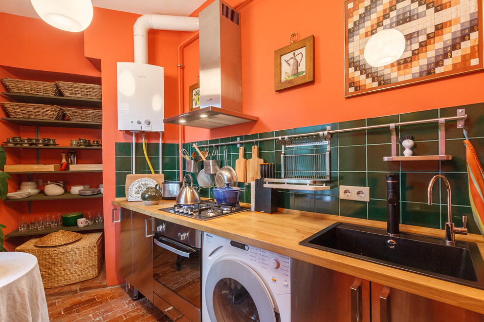 This is an example of a contemporary kitchen in Saint Petersburg.