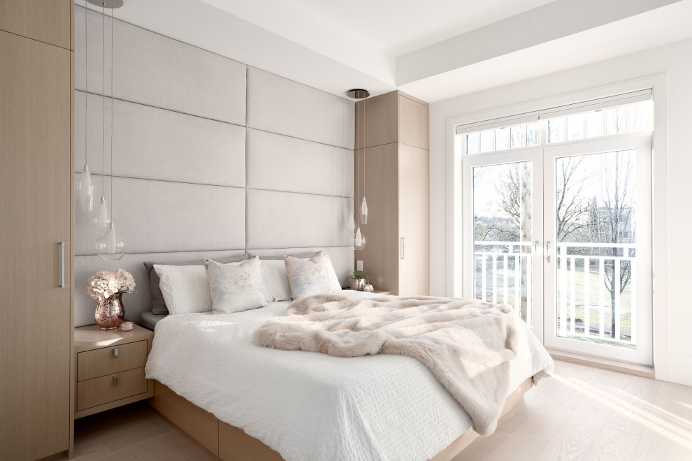 Design ideas for a mid-sized transitional bedroom in Vancouver.