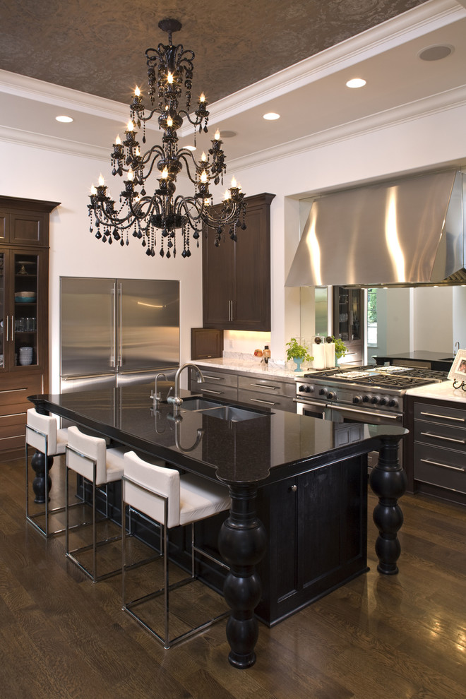 Inspiration for a mediterranean kitchen in Minneapolis with stainless steel appliances.
