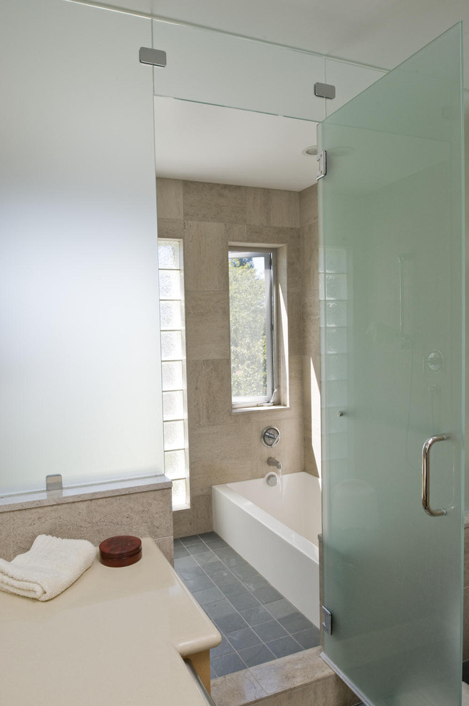This is an example of a contemporary bathroom in San Francisco with an alcove tub.