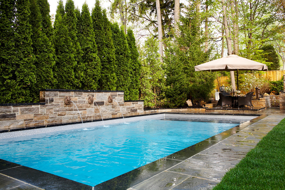 Inspiration for a traditional rectangular pool in Toronto.
