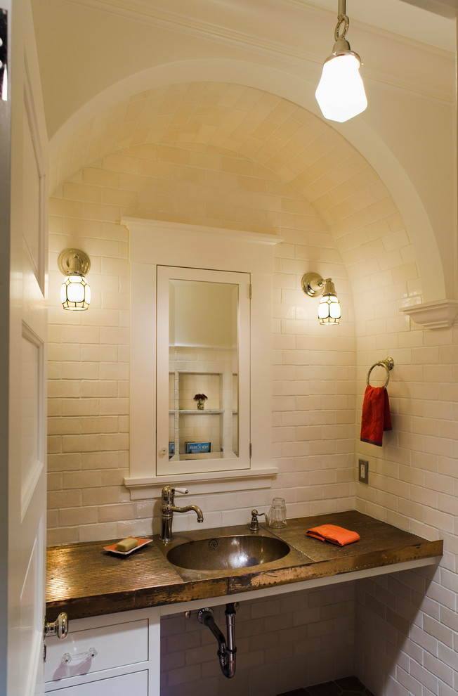 This is an example of a traditional powder room in Seattle.