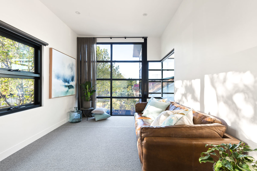 Photo of a mid-sized contemporary sunroom in Melbourne with carpet and a standard ceiling.