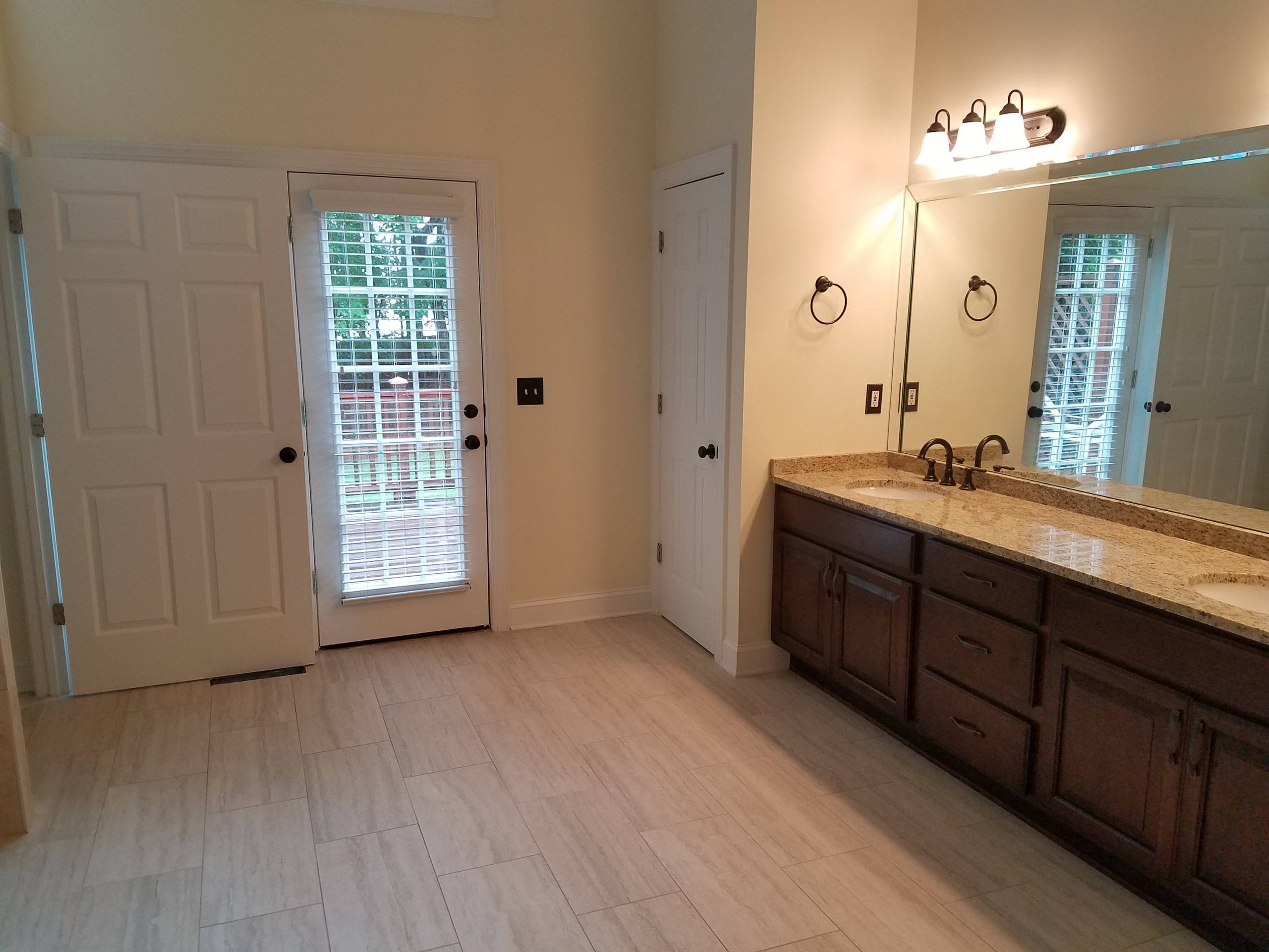 Bathroom Remodeling with Kemper Choice Maple Cabinetry in Black Forest DeWhite