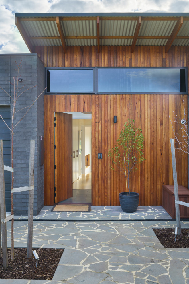 Photo of a contemporary entryway in Other with a single front door.