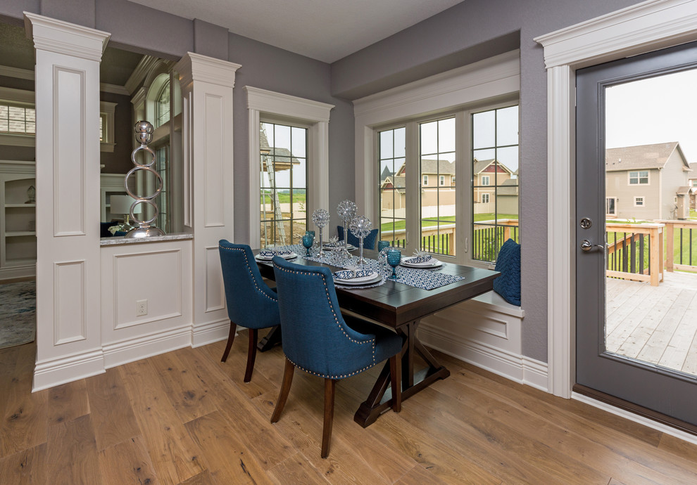 Transitional kitchen/dining room combo photo with gray walls