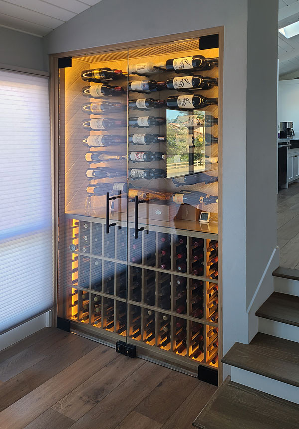 Small transitional wine cellar in Los Angeles with storage racks.