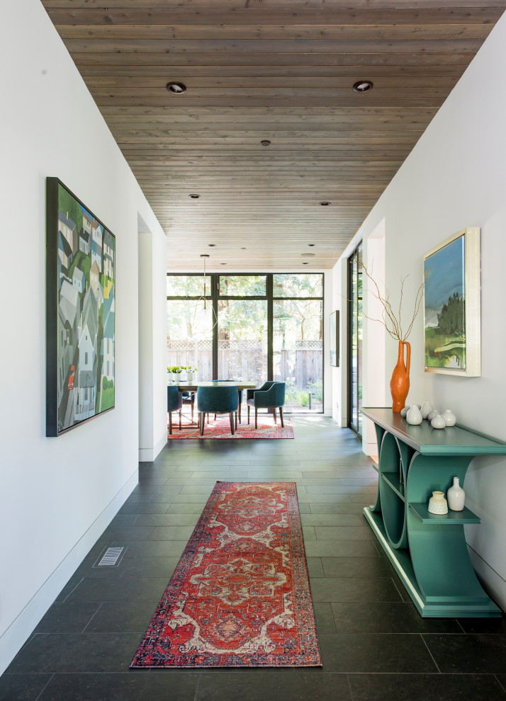 Design ideas for a contemporary hallway in San Francisco with white walls and a wood ceiling.