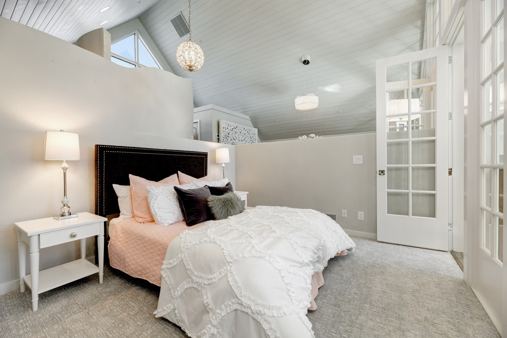Photo of a mid-sized transitional guest bedroom in Boise with grey walls, carpet and grey floor.