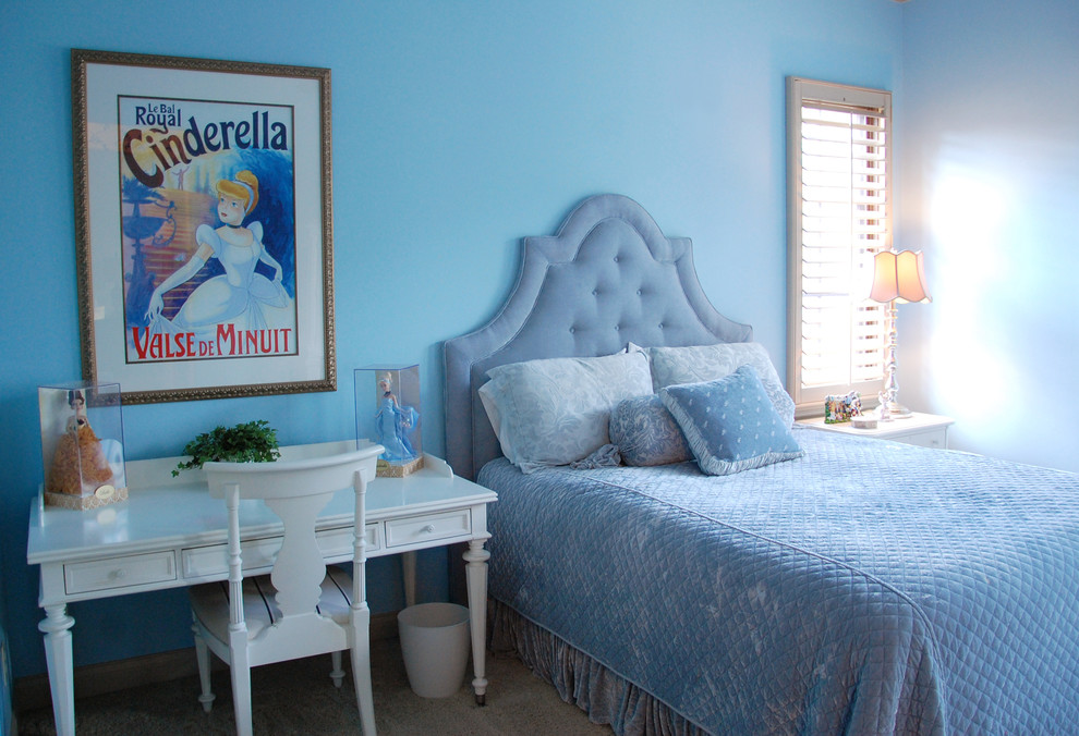 This is an example of a mid-sized mediterranean guest bedroom in Orlando with blue walls, carpet and no fireplace.