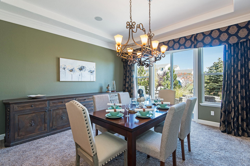 Elegant carpeted and gray floor enclosed dining room photo in Other with green walls